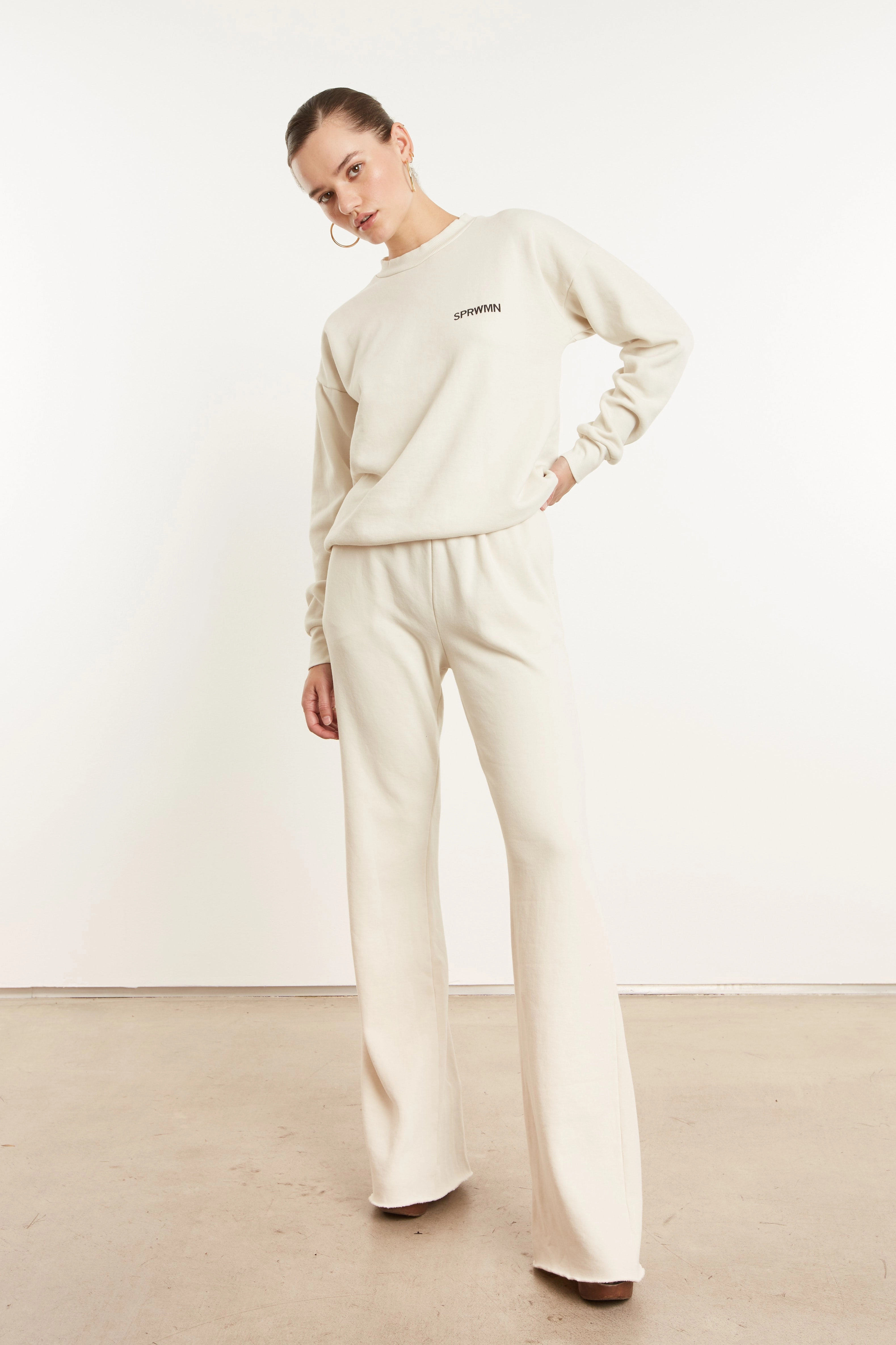 Flexible Hemline WrinkleResistant Vintage White Logo Sweatshirt